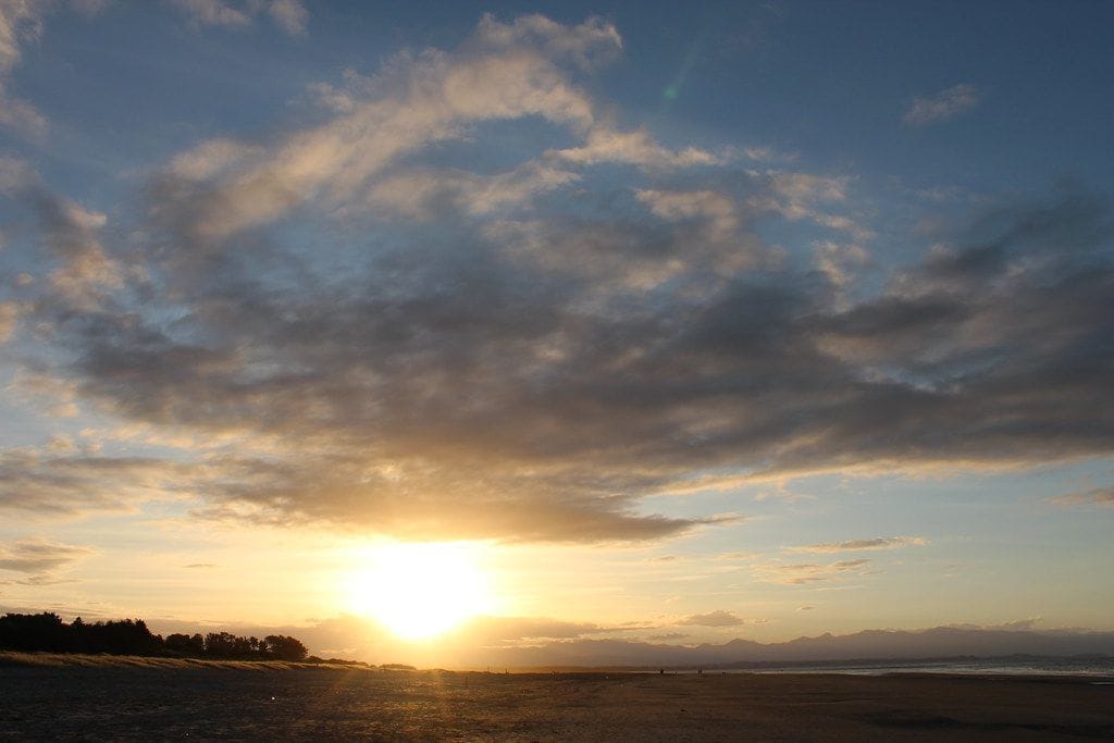 Evening sun over Tāhunanui Beach, March 2014.